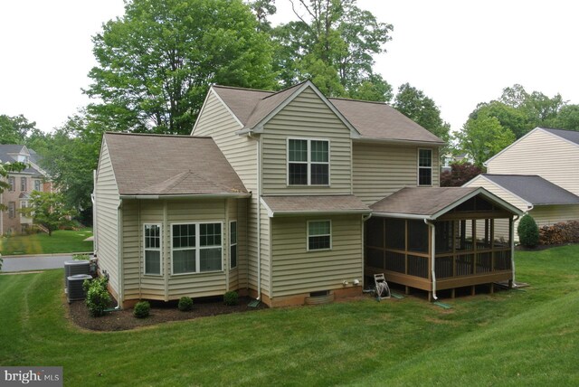 8 Farnham Way, Lutherville Timonium, MD 21093 - rear view of property featuring a sunroom, roof with shingles, and a lawn