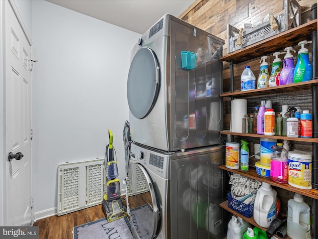 200 Rubens Cir, Martinsburg, WV 25403 - washroom featuring laundry area, stacked washer and dryer, visible vents, wood finished floors, and baseboards