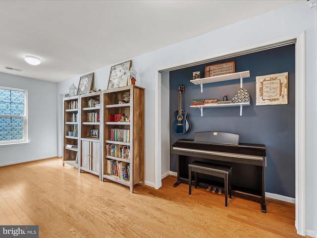 200 Rubens Cir, Martinsburg, WV 25403 - sitting room featuring visible vents, baseboards, and wood finished floors