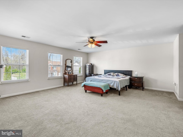 200 Rubens Cir, Martinsburg, WV 25403 - carpeted bedroom with a ceiling fan, baseboards, multiple windows, and visible vents