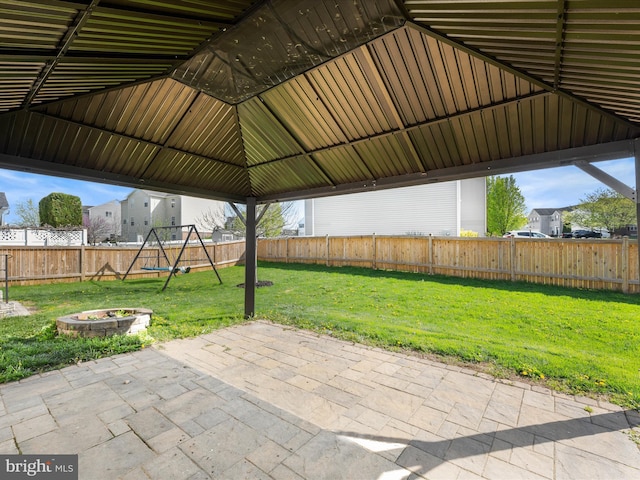 200 Rubens Cir, Martinsburg, WV 25403 - view of patio / terrace featuring a fire pit, a fenced backyard, and a playground
