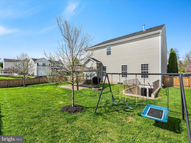 200 Rubens Cir, Martinsburg, WV 25403 - rear view of property with a patio, a fire pit, a fenced backyard, and a lawn