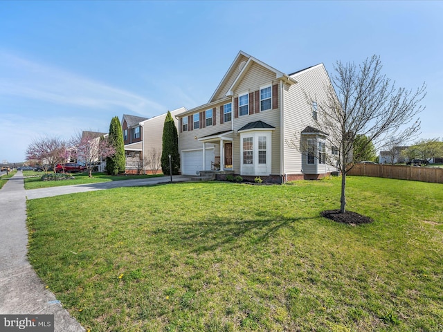200 Rubens Cir, Martinsburg, WV 25403 - traditional home with an attached garage, aphalt driveway, fence, and a front lawn
