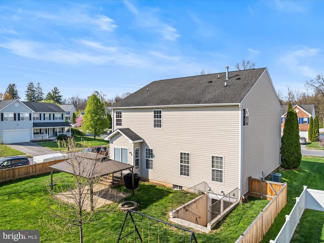200 Rubens Cir, Martinsburg, WV 25403 - back of house featuring a residential view, cooling unit, a patio area, a fenced backyard, and a lawn
