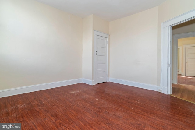 2607 Quantico Ave, Baltimore, MD 21215 - unfurnished room featuring baseboards and wood finished floors
