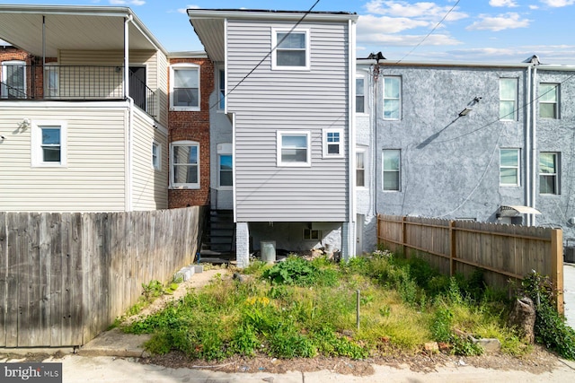 2607 Quantico Ave, Baltimore, MD 21215 - rear view of property with fence and stairs