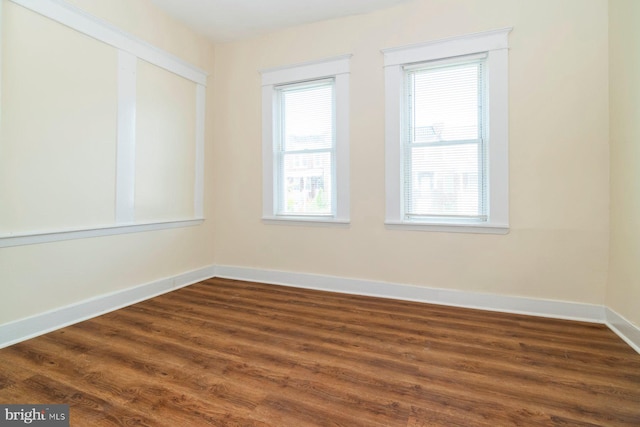 2607 Quantico Ave, Baltimore, MD 21215 - empty room featuring baseboards and dark wood-style floors