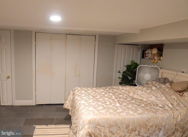 tiled bedroom with recessed lighting