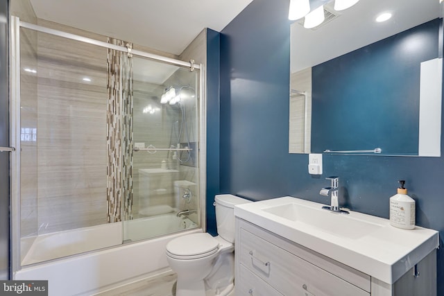 817 57th Pl, Fairmount Heights, MD 20743 - full bathroom featuring enclosed tub / shower combo, toilet, visible vents, and vanity
