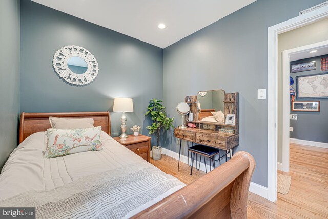 817 57th Pl, Fairmount Heights, MD 20743 - bedroom with baseboards, recessed lighting, and wood finished floors