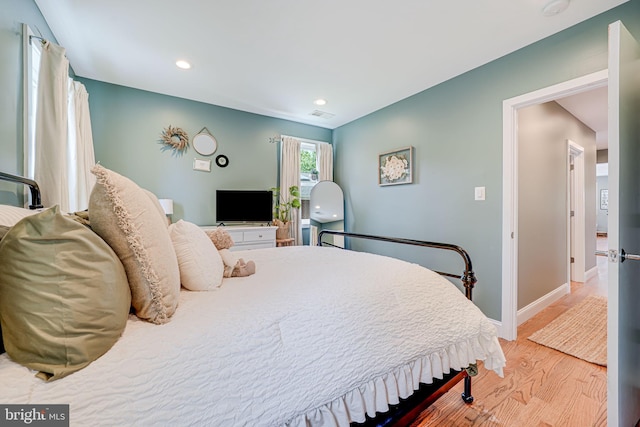817 57th Pl, Fairmount Heights, MD 20743 - bedroom featuring recessed lighting, baseboards, visible vents, and wood finished floors