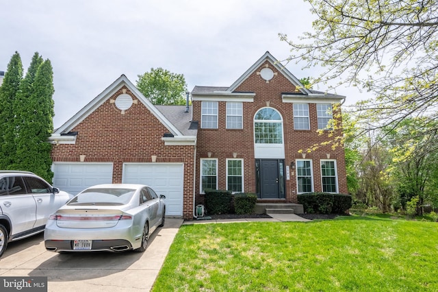 colonial house featuring brick siding, an attached garage, a front lawn, and concrete driveway