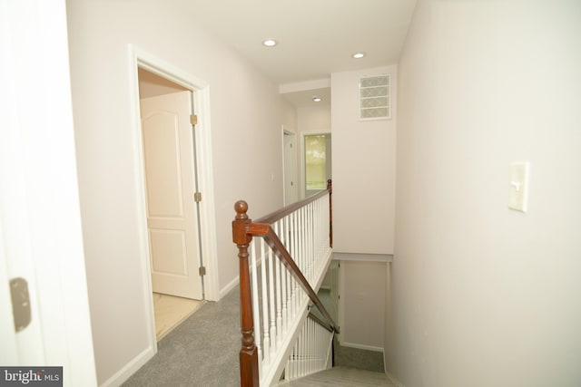 stairs featuring recessed lighting, carpet flooring, visible vents, and baseboards