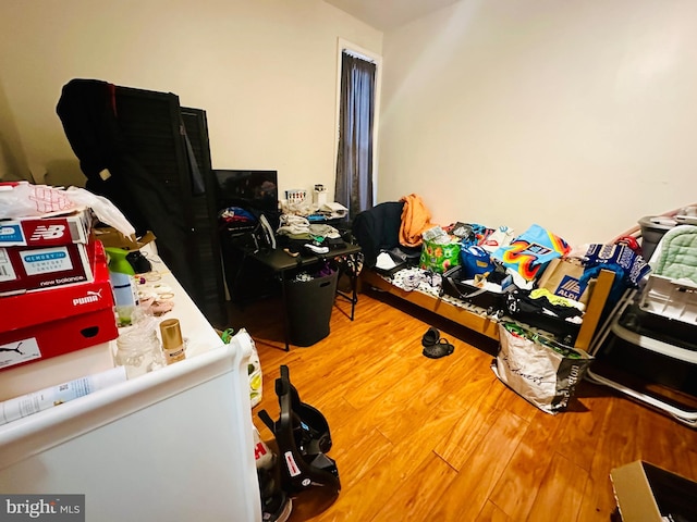 bedroom featuring wood finished floors