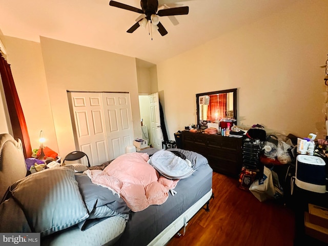 bedroom with a closet, ceiling fan, and dark wood-style floors