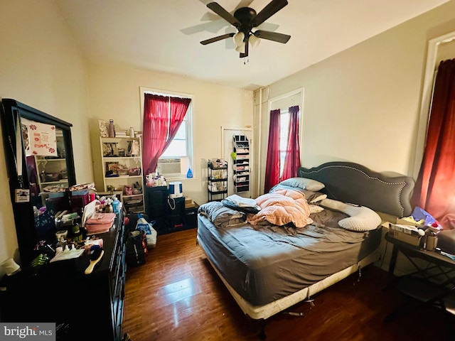 bedroom with wood finished floors and a ceiling fan