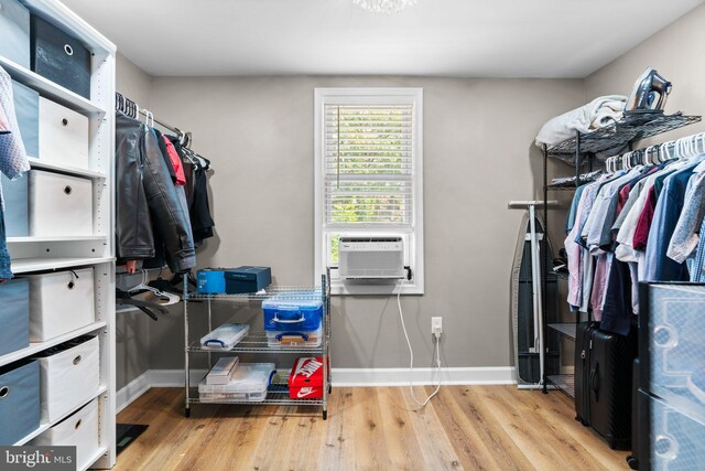 4033 Woodhaven Ave, Baltimore, MD 21216 - walk in closet with wood finished floors and cooling unit