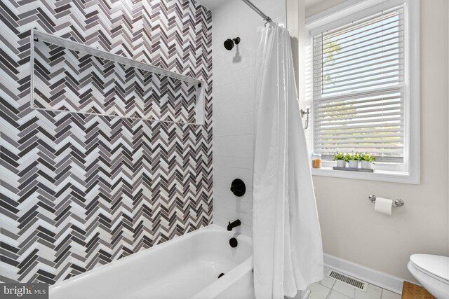 4033 Woodhaven Ave, Baltimore, MD 21216 - bathroom featuring shower / bathtub combination with curtain and tile patterned floors