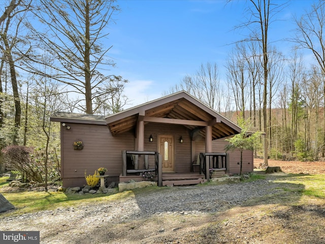 chalet / cabin with a porch