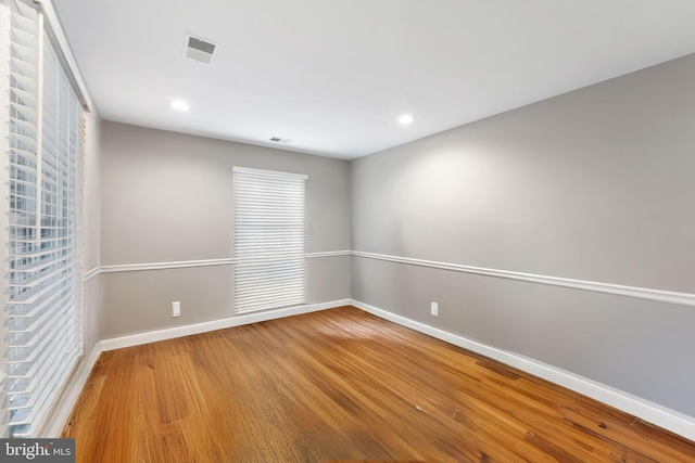 1823 Westmoreland St, Mclean, VA 22101 - spare room featuring wood finished floors, baseboards, and recessed lighting