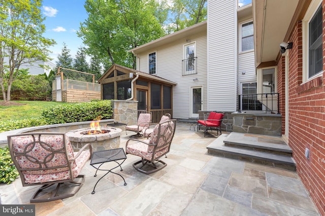 1823 Westmoreland St, Mclean, VA 22101 - view of patio / terrace featuring a fire pit and a sunroom