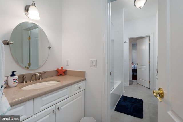 bathroom featuring tile patterned flooring and vanity