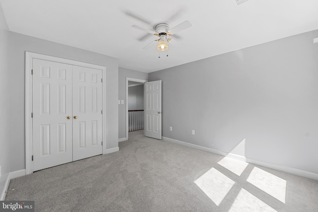 5325 Sandy Point Ln, Clifton, VA 20124 - unfurnished bedroom featuring carpet flooring, a closet, baseboards, and ceiling fan