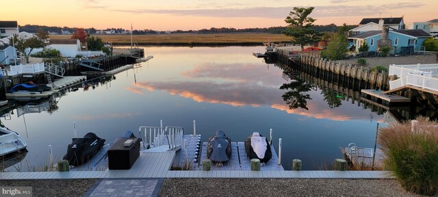 dock area featuring a water view