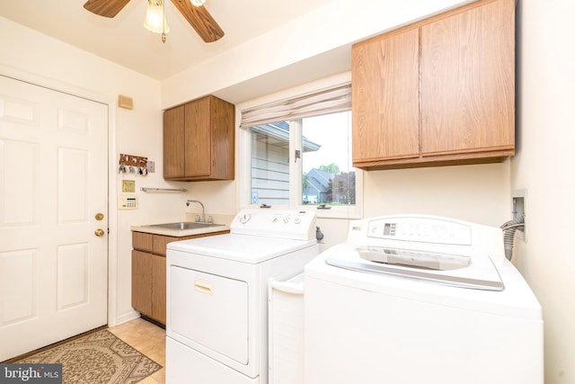laundry area featuring cabinet space, washer and dryer, and a ceiling fan