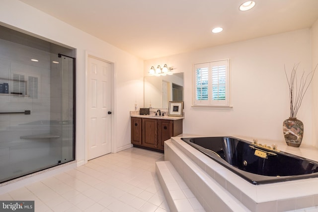full bath featuring vanity, a jetted tub, a stall shower, recessed lighting, and tile patterned floors