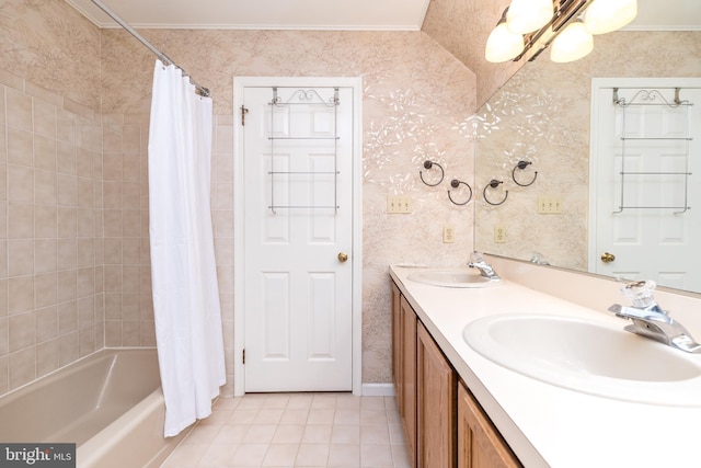 full bath featuring wallpapered walls, tile patterned floors, crown molding, shower / tub combo with curtain, and double vanity