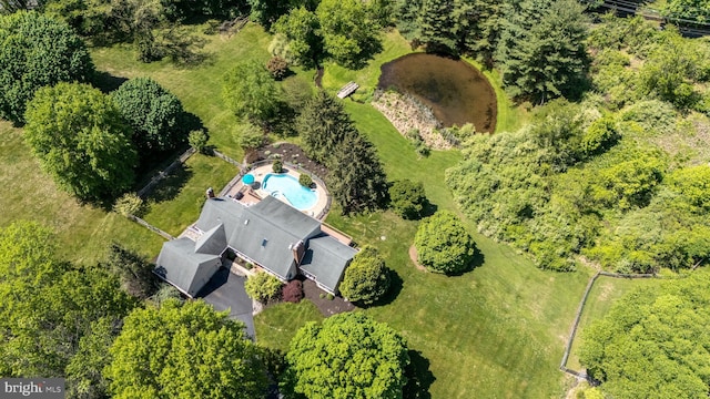 drone / aerial view of a pool