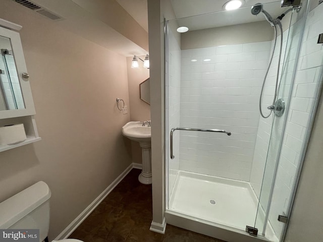 7944 Tick Neck Rd, Pasadena, MD 21122 - bathroom with a shower stall, toilet, and baseboards