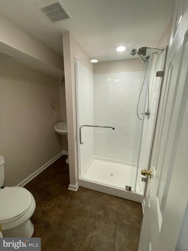 7944 Tick Neck Rd, Pasadena, MD 21122 - full bathroom with toilet, a shower stall, baseboards, and recessed lighting