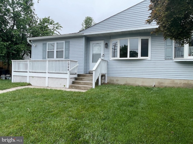 7944 Tick Neck Rd, Pasadena, MD 21122 - bungalow-style house featuring a front yard and a deck