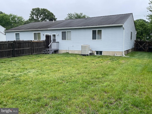 7944 Tick Neck Rd, Pasadena, MD 21122 - rear view of property featuring central AC unit