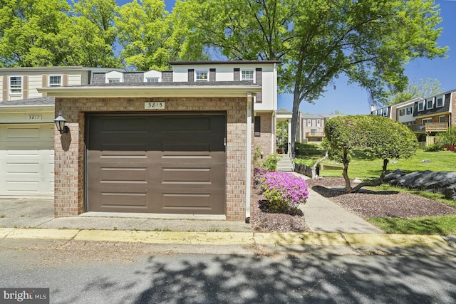 3815 Gawayne Ter Unit 31-381, Silver Spring, MD 20906 - view of front of house featuring brick siding and a garage