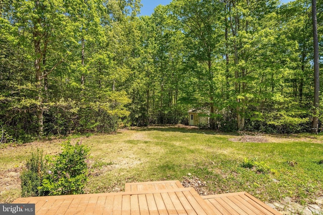 view of yard with a deck