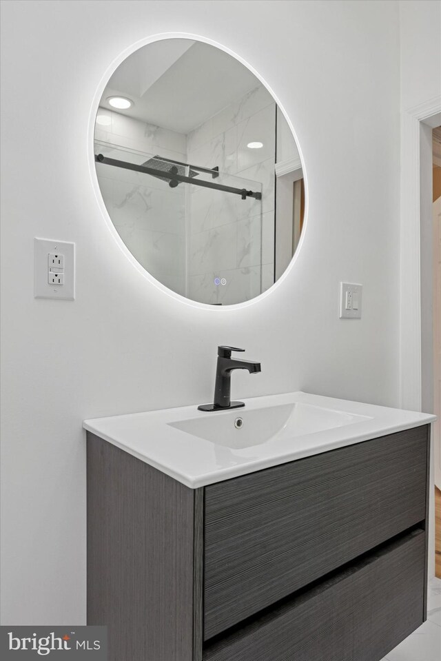 5223 Pentridge St, Philadelphia, PA 19143 - full bathroom with vanity and a marble finish shower