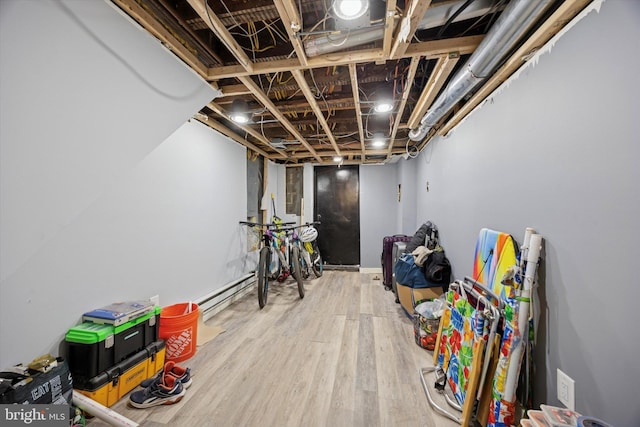 5223 Pentridge St, Philadelphia, PA 19143 - unfinished below grade area featuring wood finished floors and baseboard heating