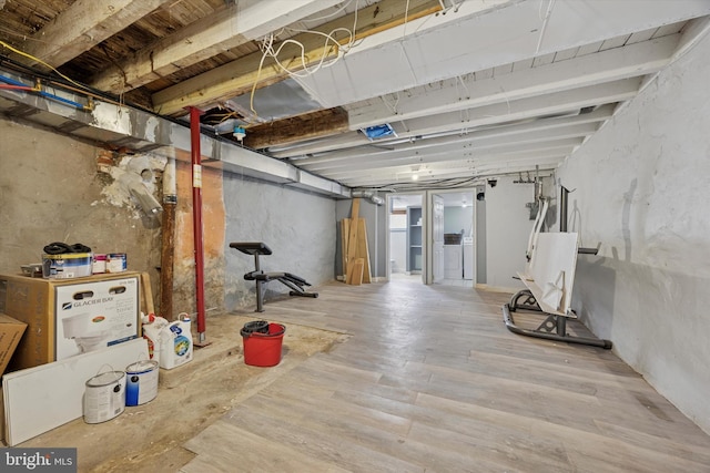 5223 Pentridge St, Philadelphia, PA 19143 - unfinished below grade area with independent washer and dryer and wood finished floors