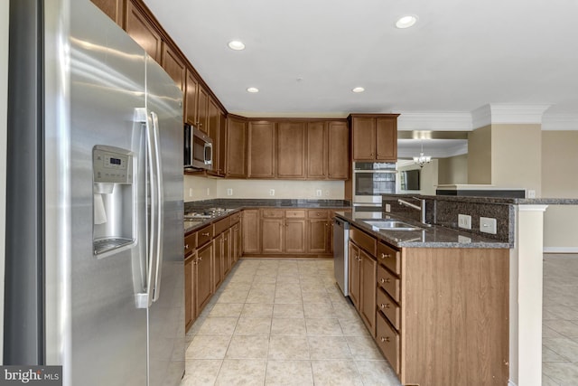 kitchen featuring ornamental molding, recessed lighting, a sink, appliances with stainless steel finishes, and light tile patterned floors