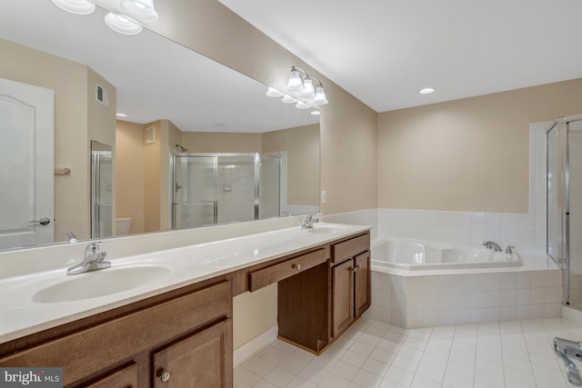 bathroom featuring a sink, tile patterned flooring, a shower stall, visible vents, and a bath