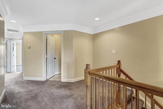hallway featuring crown molding, baseboards, an upstairs landing, carpet flooring, and recessed lighting