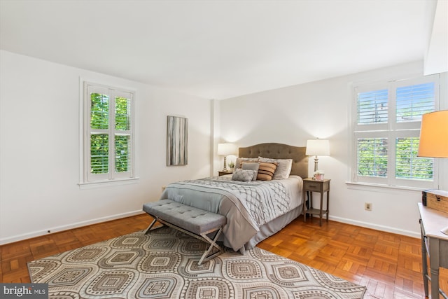 bedroom featuring baseboards