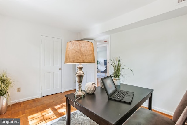 office area featuring baseboards