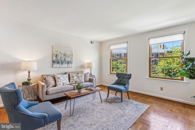 living room featuring baseboards