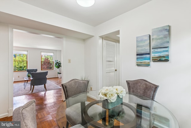 dining room featuring baseboards