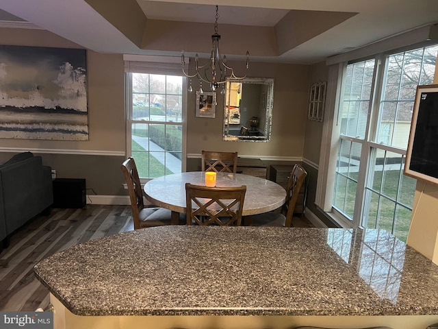 1646 Mcnelis Dr, Southampton, PA 18966 - dining room featuring baseboards, a raised ceiling, a notable chandelier, and wood finished floors