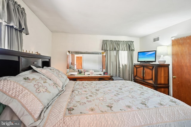 bedroom with visible vents